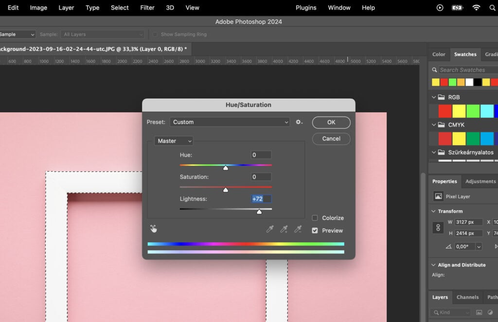 A graphic design application with a color palette in use and the screen showing an image of a pink wall.