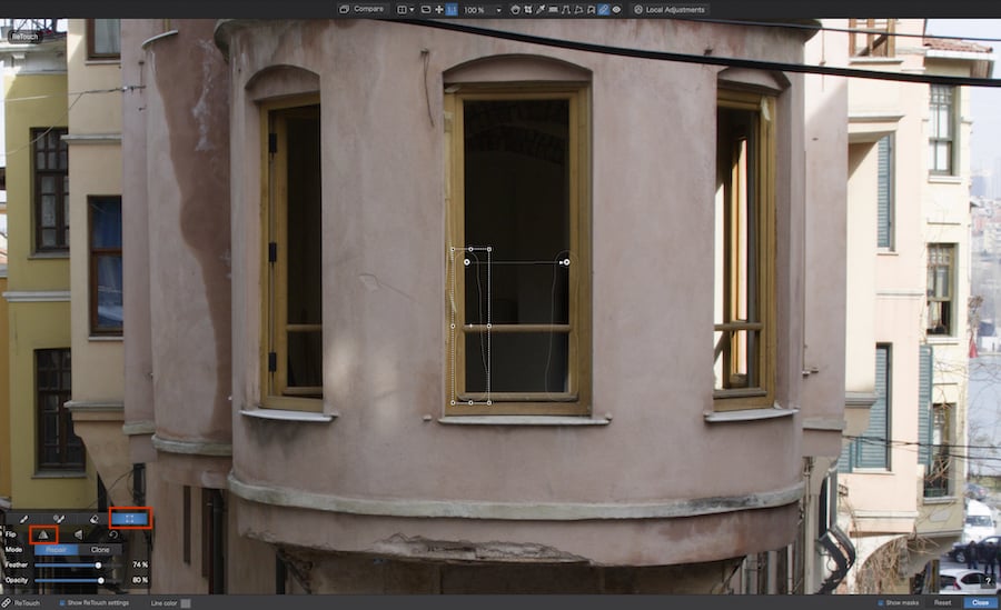 Screenshot of PhotoLab 7 interface with ReTouch tool and building window highlighted