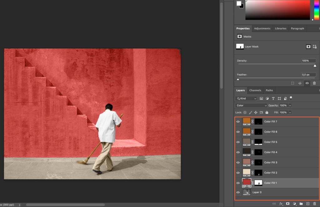 An old man standing in front of a red wall with stairs, while Adobe Photoshop is open showing the layered photo and tools.