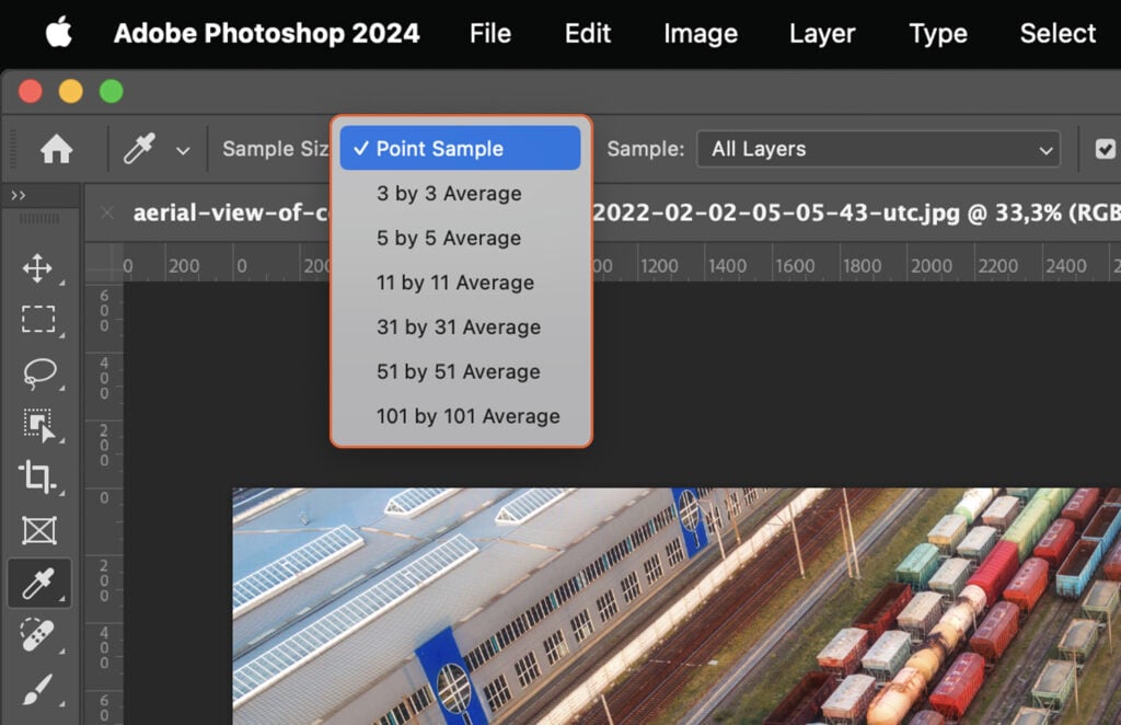 Adobe Photoshop, showing an editing interface with various tools and panels, and a sample image open in the window. 
