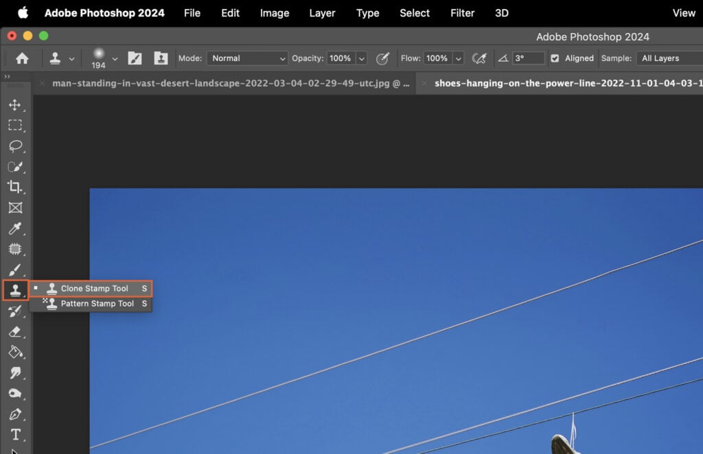 An Adobe Photoshop window, with the top part showing a panel with various filters and effects applied to an image, while the bottom part displays the original image of a blue sky without any filters.