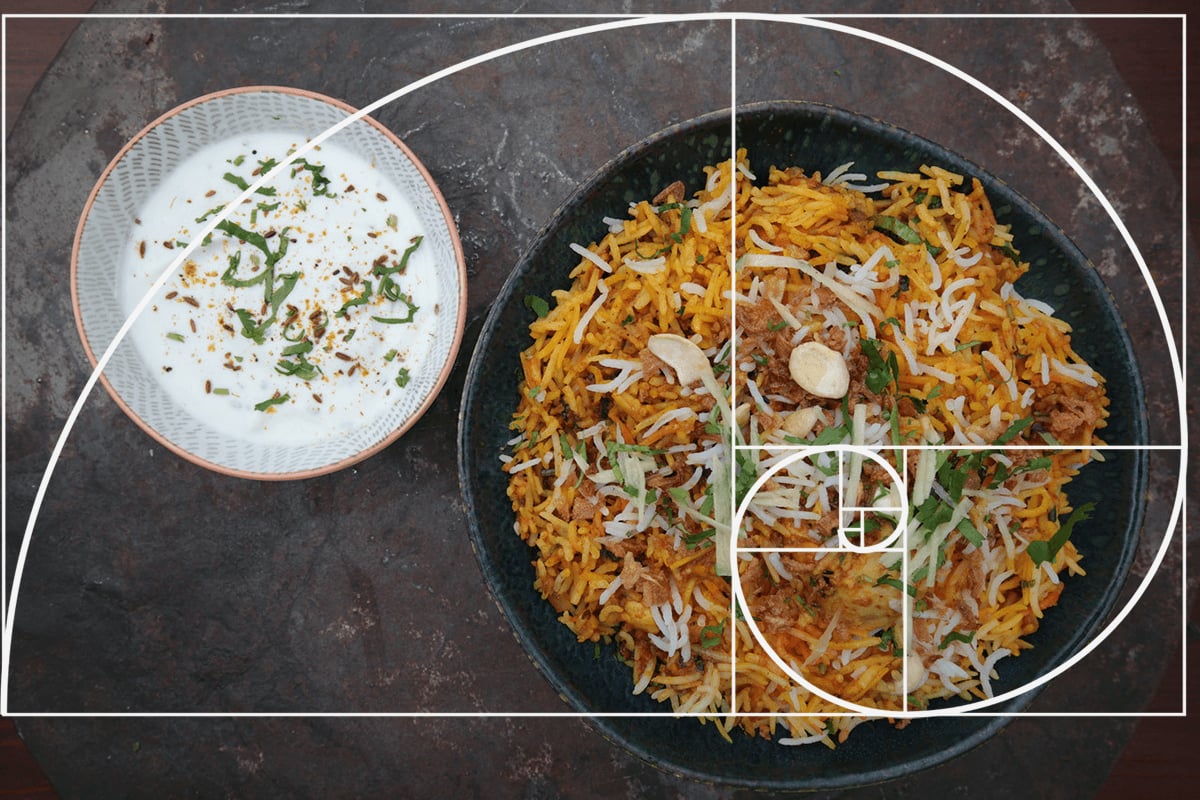 A picture of two food dishes, with the Fibonacci spiral superimposed over the top