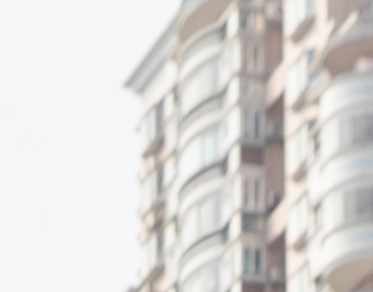 crop of a photograph showing a building in the distance