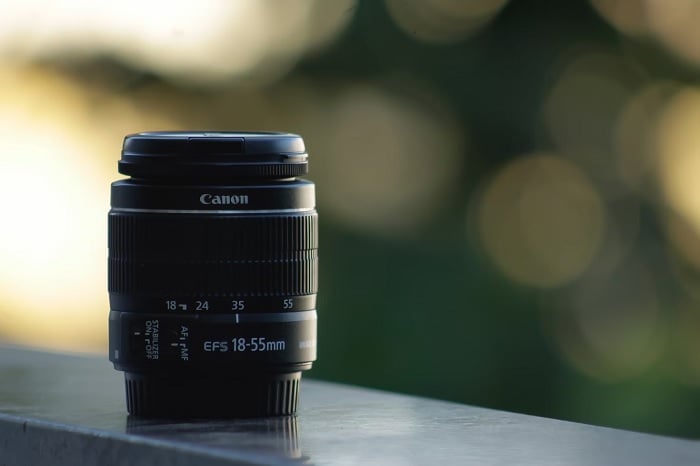 Image of Canon EF-S lens standing on surface