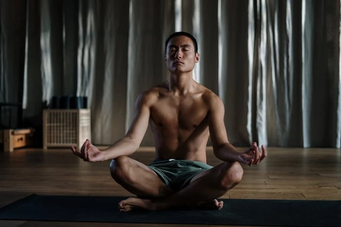 Man in a studio meditating