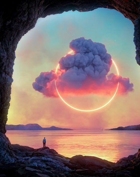 Seascape with ring of light with clouds going through it