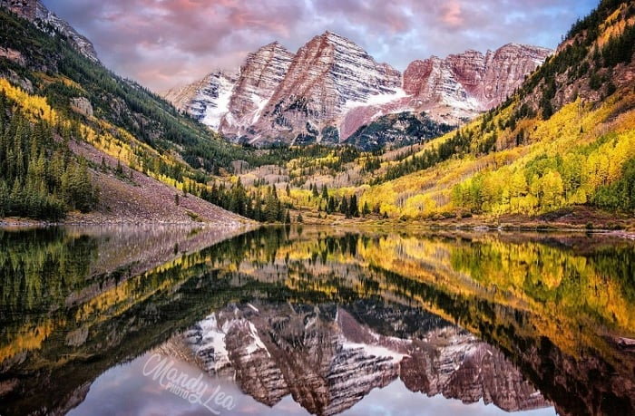 Lake with big mountains behind