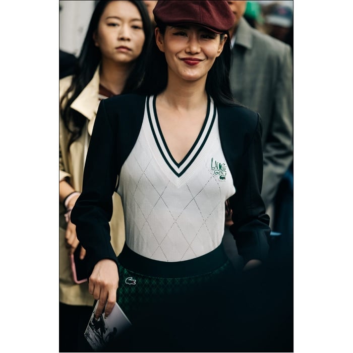 Young woman wearing Lacoste clothes