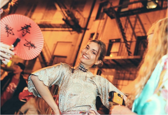 Woman smiling at camera in night shoot