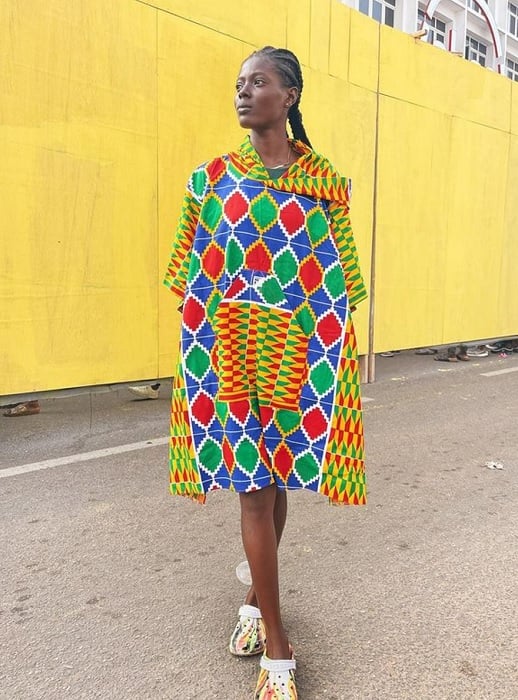 Woman in brightly colored shawl