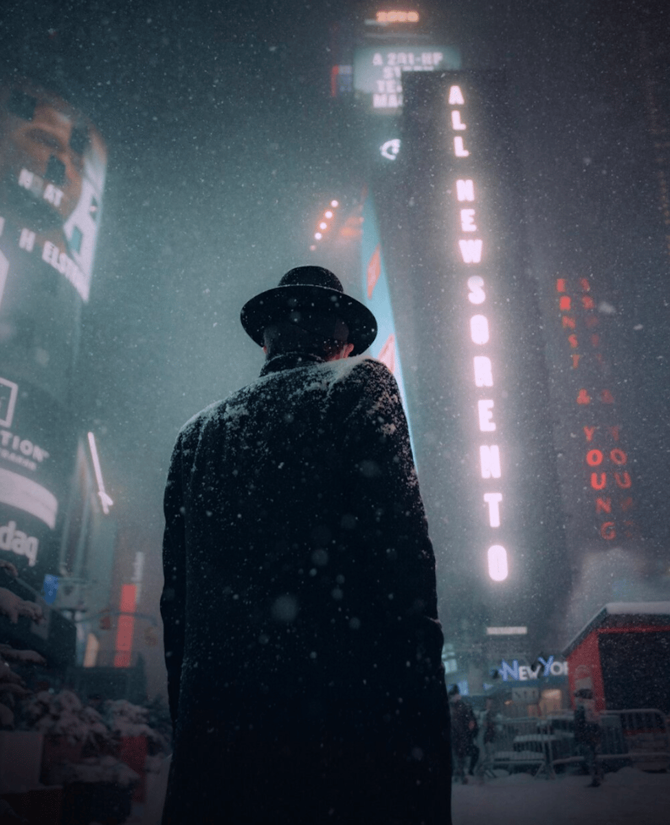 photography of man in snow in city centre 