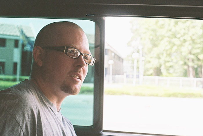 A man on a bus shot with window lighting