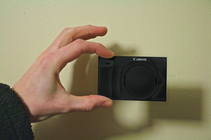 Photography business cards that resemble a Canon point and shoot camera by Rebecca Willsone