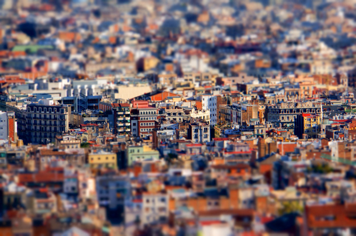 Uma foto aérea de uma paisagem urbana extensa com uma lente tilt-shift 