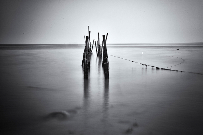 Long exposure photo of a waterscape in black and white