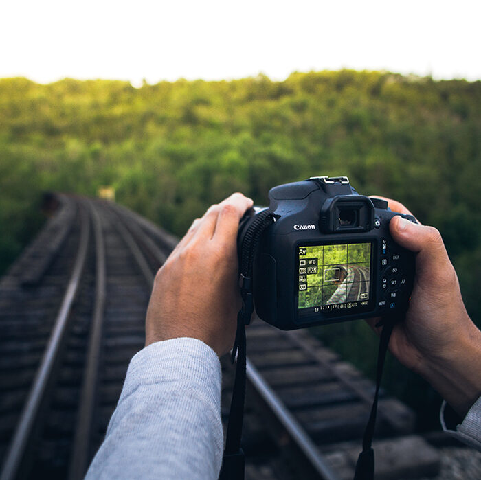 Photo of someone taking a photo on the railway