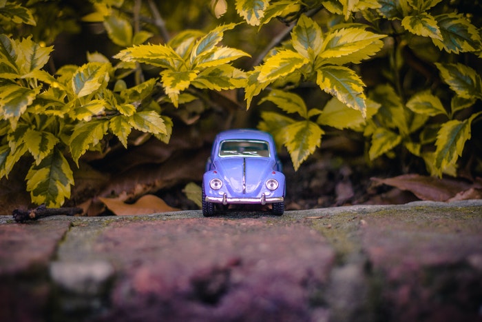 A toy car on a wall