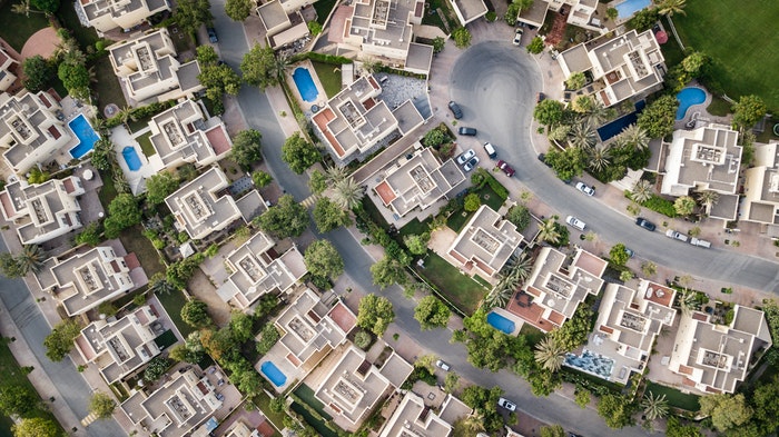 drone photo of a neighborhood of consisting of villas