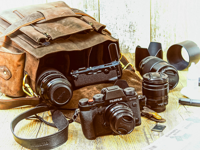 Camera bag with Fuji camera body and lenses